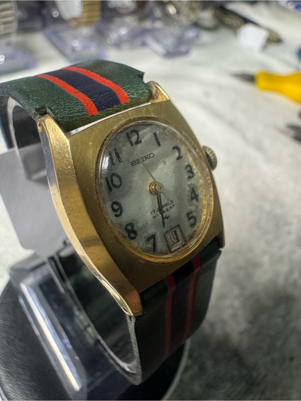 Seiko Gold-Tone Analog Watch with Green and Red Stripe Strap - Picture 5 of 8